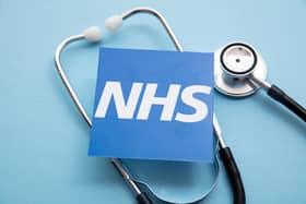 LONDON, UK - July 2021: NHS National health service logo with a stethoscope.