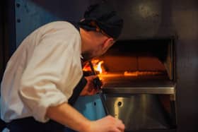 The pizzas are made in wood-fired pizza ovens (Photo: Oakman Inns)