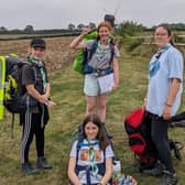 Scouts with rucksacks in the Countryside