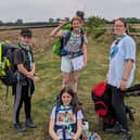 Scouts with rucksacks in the Countryside