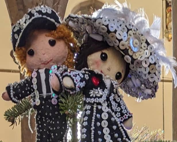 A pearly king and queen celebrate the success of last year's festival