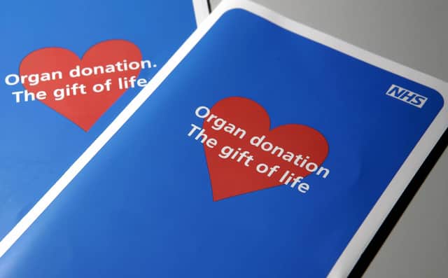 Two organ donor application leaflets. Picture: Leon Neal/AFP via Getty Images