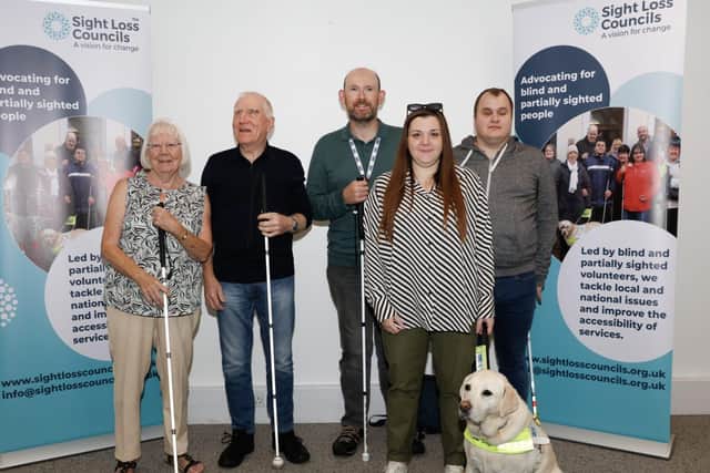 Sight Loss Council volunteers, with SLC Engagement Manager Sam and her guide dog Lizzie