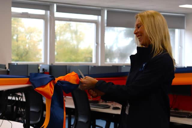 Vanessa Hunt cuts the ribbon. Image supplied by HUC