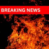The fire involves a boat and a shed at Kelpie Marine, off the Great North Road, near Roxton