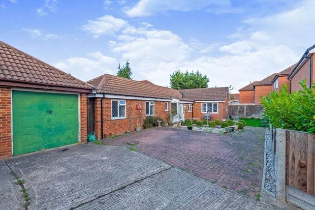 This two-bed bungalow in Vanguard Close, Kempston, was reduced by 9.2% in October. It's on the market with offers over £295,000. Boasting plenty of space, the home is tucked away in a quiet corner off Hillgrounds Road, with ample parking and a single garage