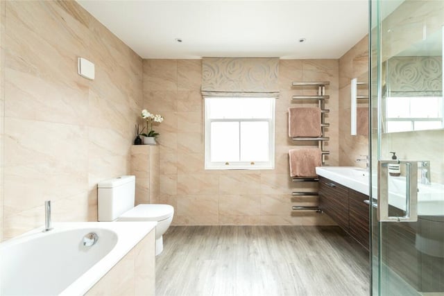 This master en suite is one three bathrooms in the house