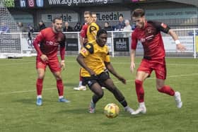 Bedford's Afolabi Soyemi-Ololade makes his presence felt at Mickleover on Saturday. Photo by Adrian Brown.