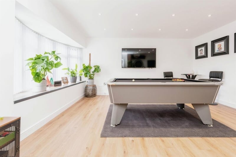 At the front of the house, this room is currently being used as a games room - but it doesn't mean you have to