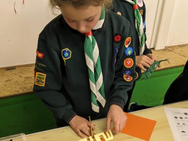 Cubs making paper craft for Lunar New Year