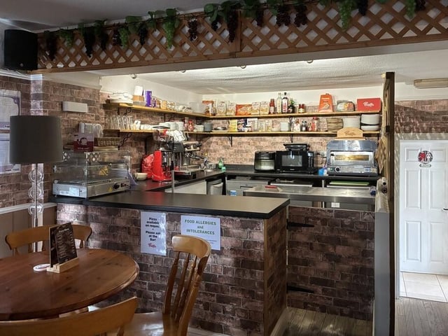 A newly installed coffee and pizza bar has been constructed within the upper section of the ground floor