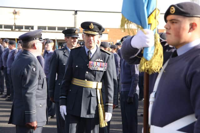 AVM Rich Maddison inspecting the parade with Wing banner bearer Sgt Ross of Oakley Squadron and on the left, OC of Bedford Squadron, Flt Lt Llewellyn.
