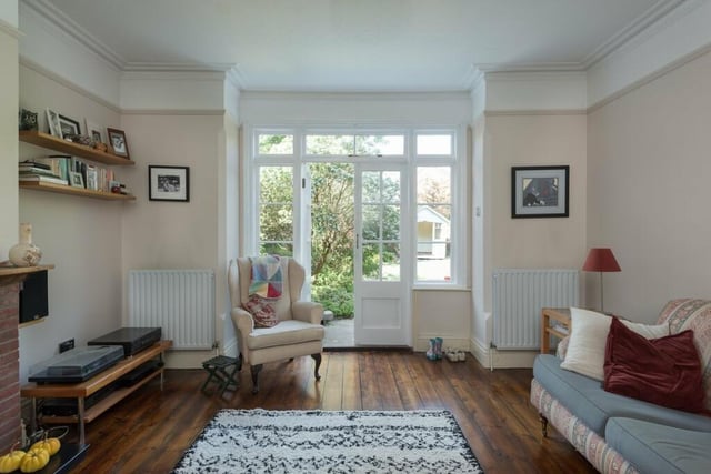 Boasting French doors to the garden, this room measures 14ft 1in by 15ft 5in