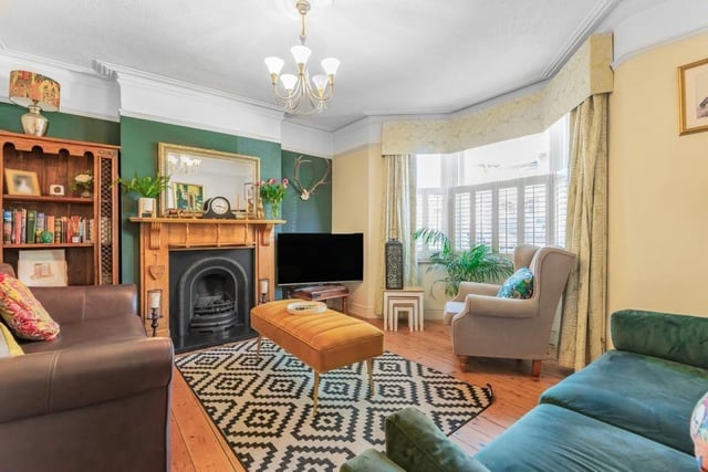 The lounge is to the front of the property with original internal door and picture rail. Double glazed bay fronted sash style window and wood flooring. A wooden mantlepiece with inset living flame gas fire