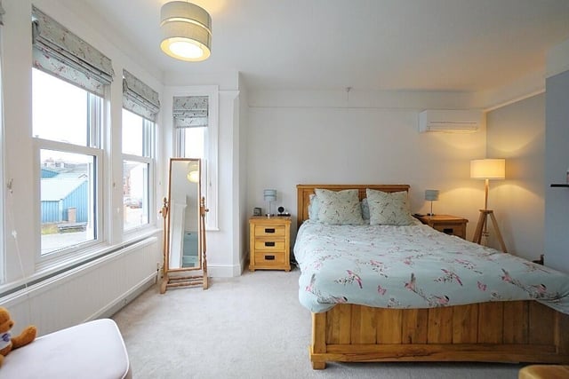 The main bedroom boasts a fireplace and box bay window. There is air conditioning and an en suite. There are three further double bedrooms