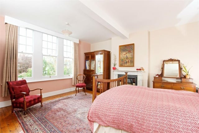 Situated at the back of the house, this bedroom - which has a bathroom adjoining - measures 15ft 11in by 15ft 6in