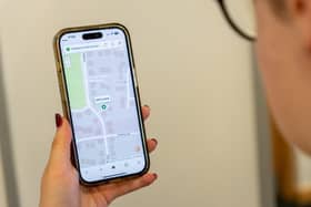 A customer checks Burton Smith’s live tracker