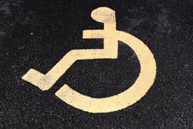 A sign for a disabled parking space