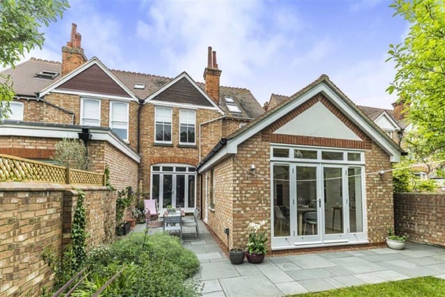 Situated on a tree-lined road, this is an attractive home with a brick wall and railings as well as plenty of planted shrubs and bushes. There are two iron gates; one to the porch and entrance door and the other leading to the side passage and gated access to the rear garden