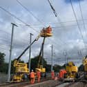 Engineers installing overhead lines as part of the Midland Mainline upgrade