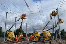 Engineers installing overhead lines as part of the Midland Mainline upgrade