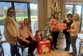 Gill Crow BAA, Elstow Manor resident John Skevington, Elstow Manor Receptionist Isla McAllister, Lead Homemaker at Elstow Pooja Mahendru, and Hazel Kumar and Jo Rogers, who are volunteers with FACES Bedford.