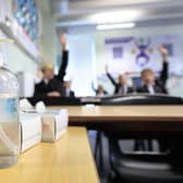 Hand sanitiser in a classroom