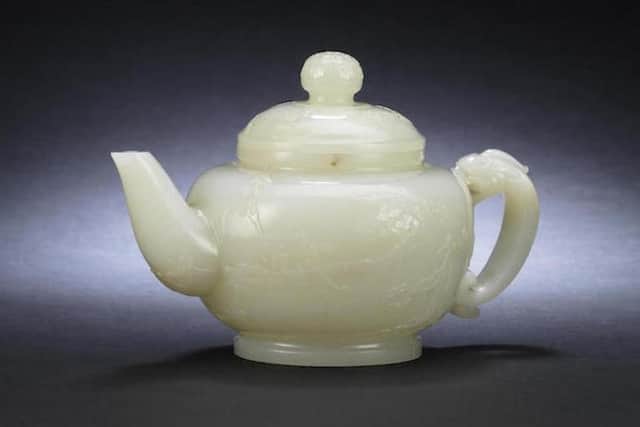 A rare pale green Jade teapot which was also sold Bonhams