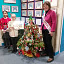 Pupils from Edith Cavell Primary School with their winning tree and festival chair, Margaret Oakley