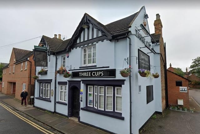 The guide called the Three Cups a "comfortable inn dating from the 1770s." It added: "Old wood panelling helps retain some of the pub’s original character. An attractive garden offers extra seating under cover"