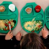 File photo of children eating a school meal.