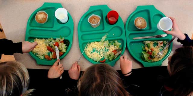 File photo of children eating a school meal.
