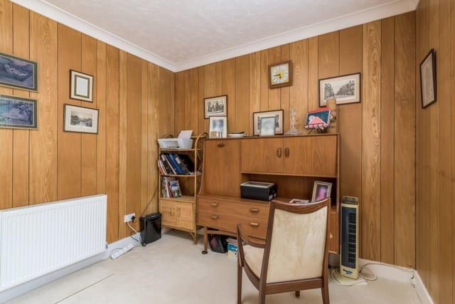 Measuring 9ft 10in by 9ft 7in, this bedroom has fabulous wood panelling, so could easily be used as a study instead