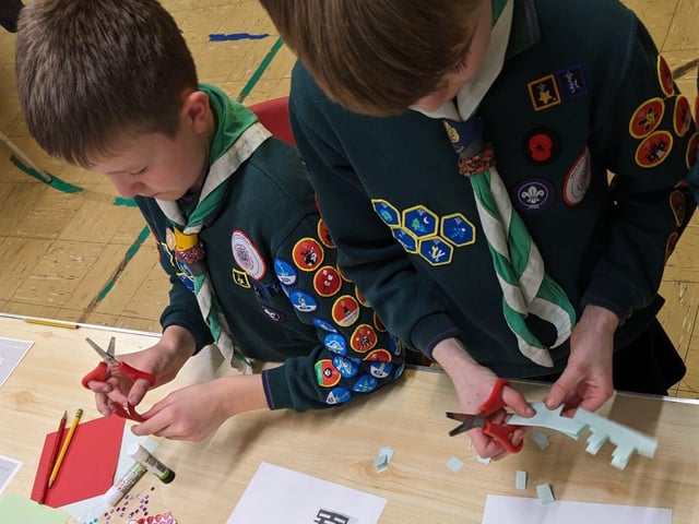 Cubs making paper craft for Lunar New Year
