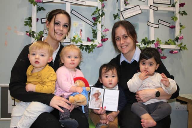 Cherry Trees Day Nursery children with their card from Kensington Palace 