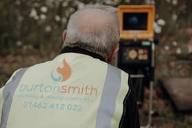 A member of the Burton Smith team carries out a CCTV drain inspection