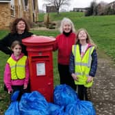The litter pick was supported by Councillors Colleen Atkins, right and Zara Layne, pictured with Florrie and her friend