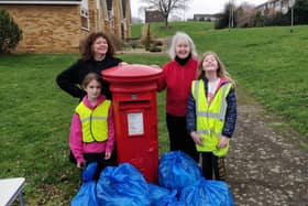 The litter pick was supported by Councillors Colleen Atkins, right and Zara Layne, pictured with Florrie and her friend