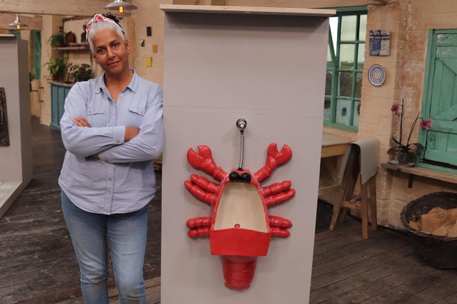 Winning through: Christine pictured in the semi-final  - her lobster urinal made for Bathroom Week helped win her a place in the final round, to be broadcast this Sunday