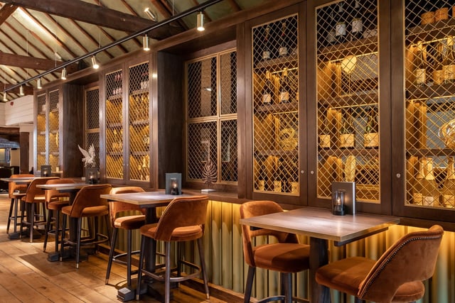 The new feature wine wall divides up the large bar space, giving an intimate, yet upmarket, feel