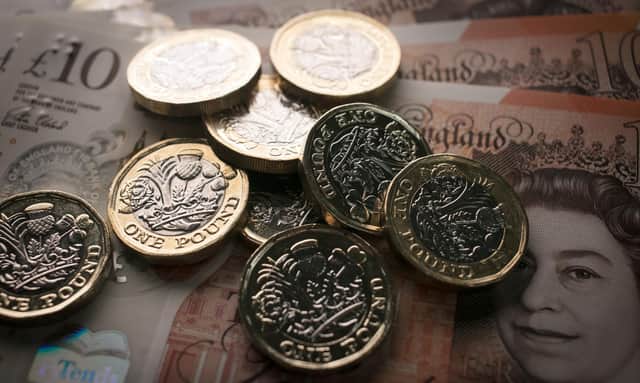 File image of £1 coins and £10 notes (Photo Illustration by Matt Cardy/Getty Images)