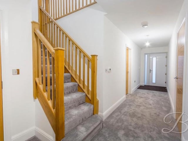 The entrance hallway leads to a downstairs toilet with wash hand basin, and also guides us to the oak staircase, taking us to the first floor of the Ravenshead property.