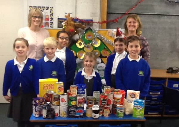 Carlton C of E Primary School with items for the food bank.