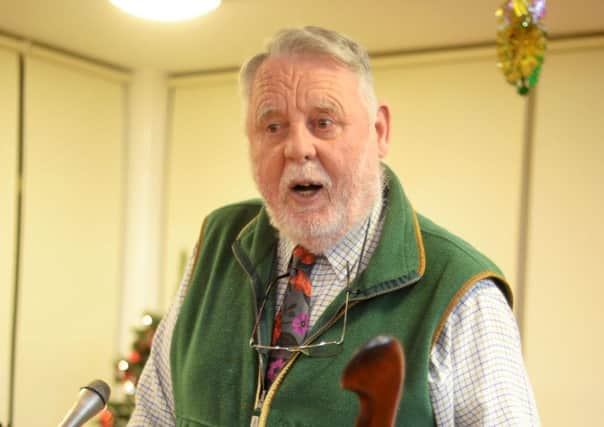 Terry Waite leads a charity auction at Emmaus Village Carlton in Bedfordshire