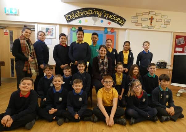Renhold VC Primary School assistant headteacher Lisa Larham with year 5 pupils.