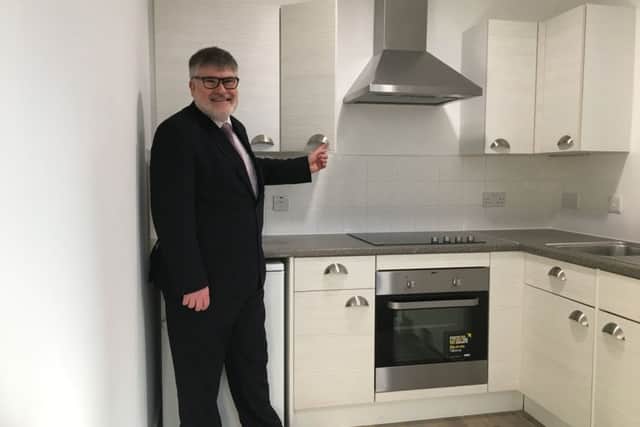 Mayor of Bedford Dave Hodgson inspects the kitchen in one of the apartments
