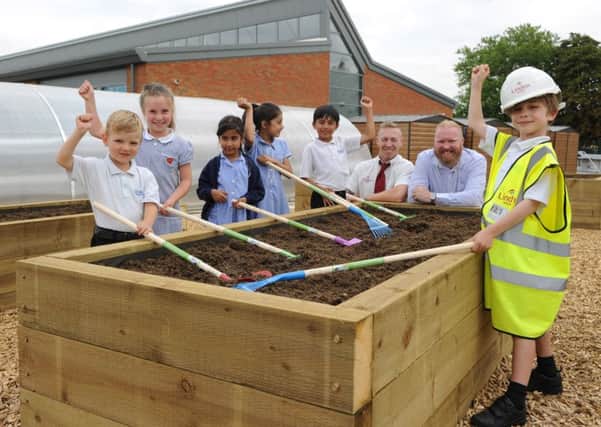 Great Ouse Primary pupils tend their allotment