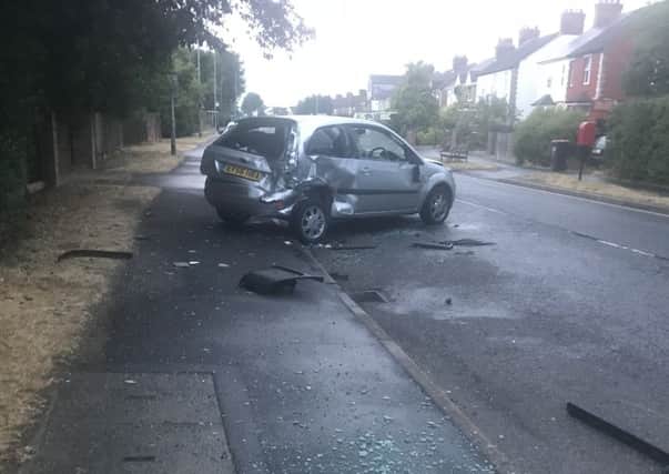 One of the cars hit by a stolen school minibus following the raid