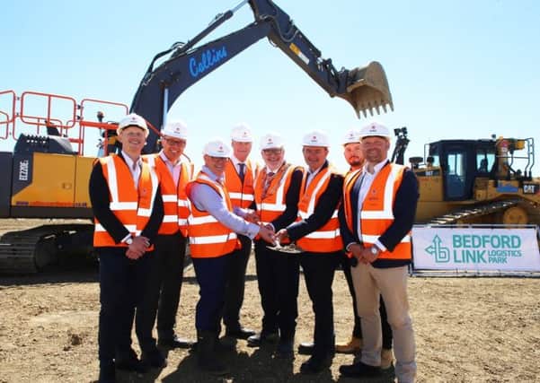 Mayor of Bedford Borough Dave Hodgson at start of construction of new logistics buildings.