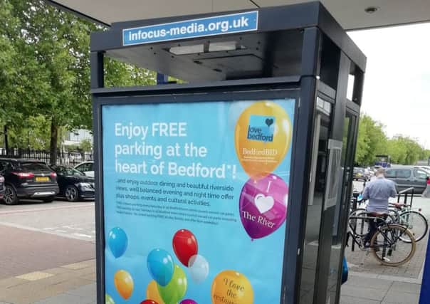 Poster at bus stop in MK promoting Bedford free parking